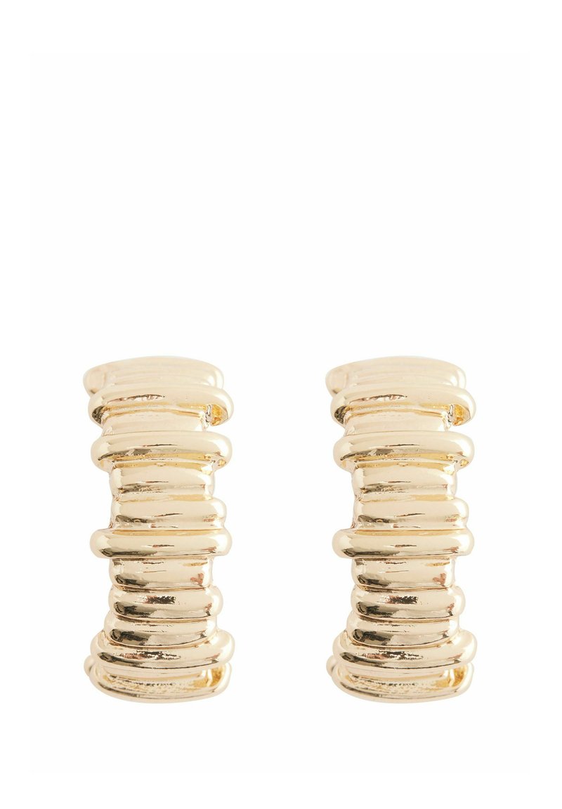 Gold-tone earrings featuring a stacked, ribbed design with smooth, rounded edges and a polished surface, adding texture and dimension.