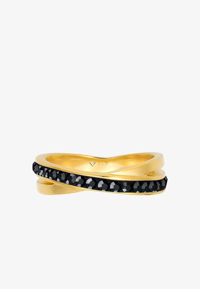 Bague en bande d'or avec une rangée diagonale de petites pierres noires rondes sur le devant, marquée 925 à l'intérieur de la bande.