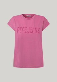 Rosa bomullströja med korta ärmar, med utskurna bokstäver "PEPEJEANS" på bröstet. Enkel, rund halsringning och en avslappnad passform.