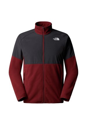 Veste zippée pour hommes avec col montant, panneau supérieur gris foncé, corps inférieur et manches bordeaux, avec le logo blanc de The North Face sur la poitrine.