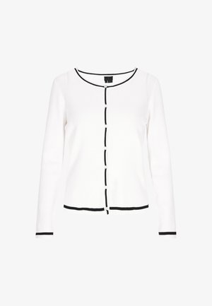 Cardigan blanc à manches longues avec texture côtelée, bord noir le long du décolleté et de l'ourlet, et boutons noirs le long du centre.