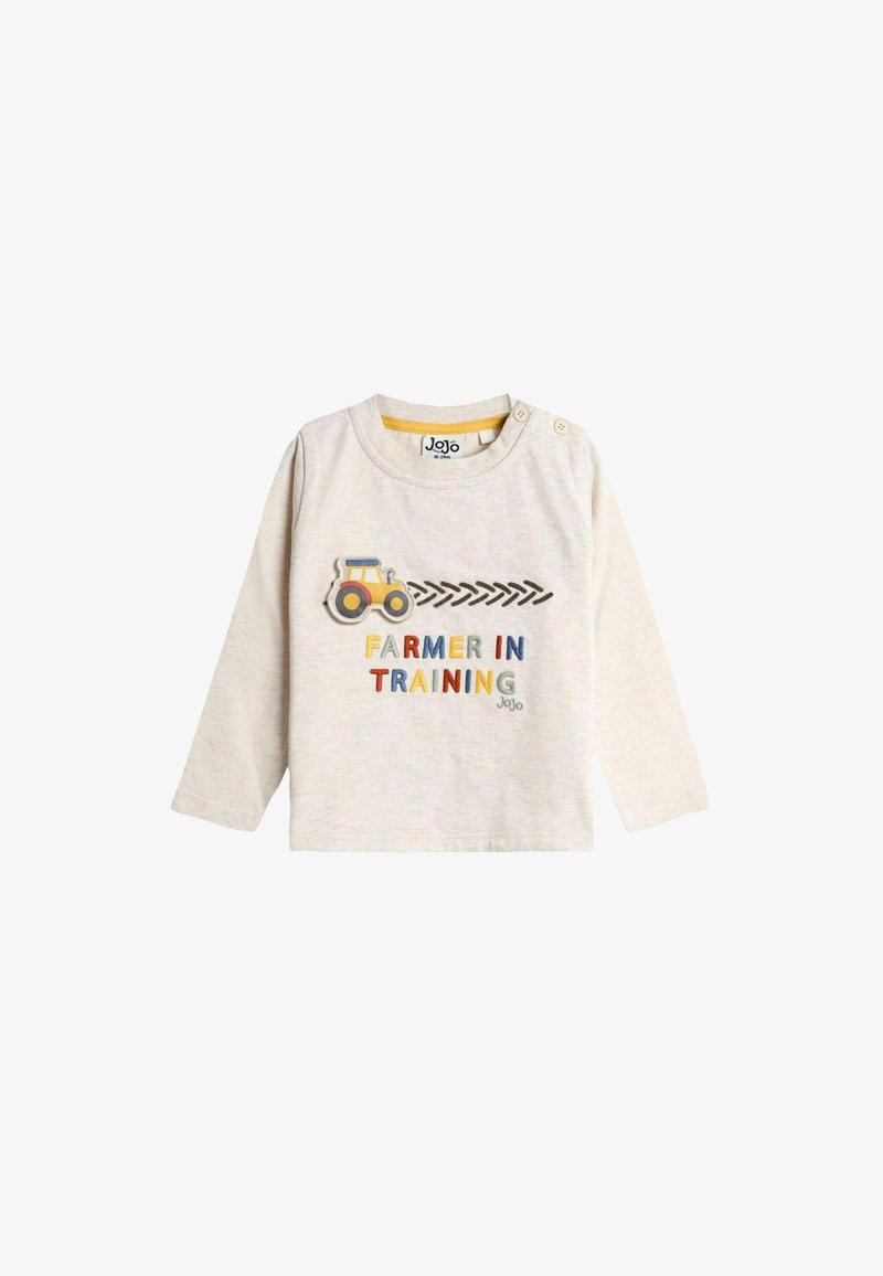 Pitkähihainen, vaaleanbeige puuvillapaita, jossa on "Farmer in Training" -teksti värikkäillä kirjaimilla ja keltainen traktorigrafiikka edessä.