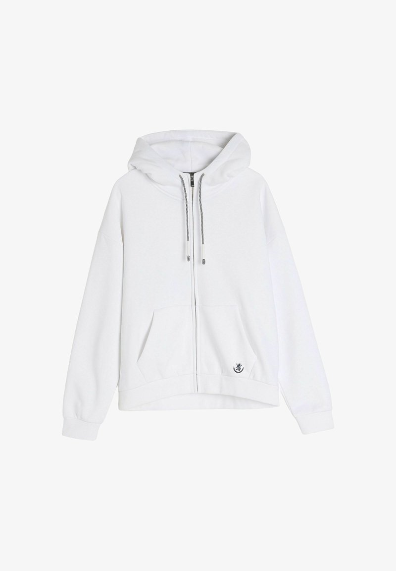 Biała bluza z kapturem zapinana na zamek z dużym kapturem, przednią kieszenią, ściągaczami przy mankietach i dolnym brzegu oraz małym graficznym logo na dolnym prawym rogu.