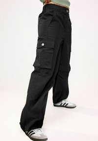 Next RIPS - Kareiviško stiliaus kelnės - black