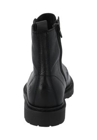 Stivaletto alla caviglia in pelle nera con finitura liscia, chiusura laterale con zip e suola in gomma testurizzata; dotato di linguetta per una facile calzata.