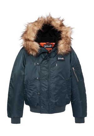 Veste d'hiver bleu foncé avec capuche doublée de fourrure, boutons et fermeture éclair à l'avant, étiquette de marque Schott sur la poitrine et à l'intérieur du col.
