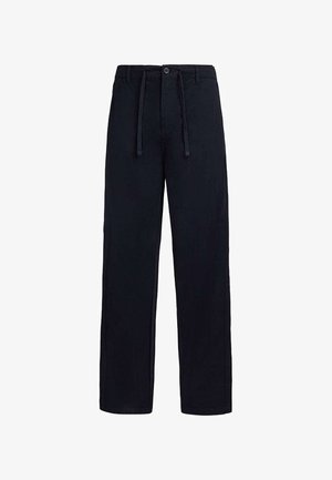 Pantalon noir à jambe droite avec fermeture à bouton et fermeture éclair, passants pour ceinture et taille ajustable avec cordon de serrage.