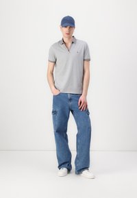 Tommy Hilfiger PERFORMANCE ZIP  - Polo - medium grey heather