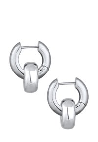 Boucles d'oreilles en argent à clou présentant un design circulaire avec une finition lisse et polie, et un accent tubulaire au centre.