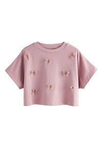 Roze cropped T-shirt met korte mouwen, voorzien van meerdere zachte, getextureerde stoffen strikjes verspreid over de voorkant. Ronde halslijn, ontspannen pasvorm.