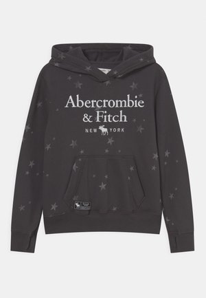 Donkergrijze hoodie met een sterrenpatroon, voorzak en witte tekstbranding. Gemaakt van zachte stof met ribgebreide manchetten.