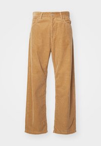 Beige kordfløjlsbukser med vide ben, tekstureret stof, forlommer og lukning med metalknap i taljen.