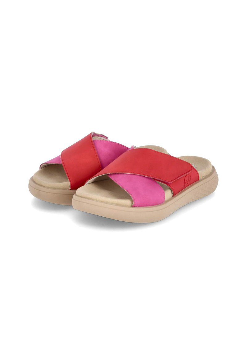 Red and pink slide sandals featuring a cross-strap design. Made of smooth leather and suede with a textured beige rubber sole.