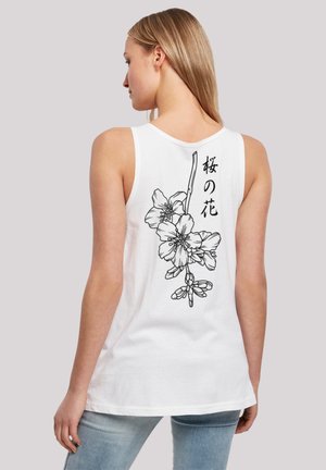 White tank top featuring a black floral design on the back with Japanese text. The fabric appears lightweight with a relaxed fit.