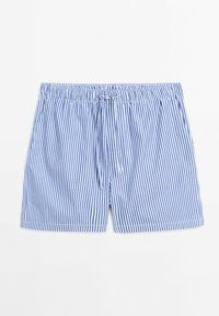 Pantaloni da bagno a righe blu e bianche con elastico in vita, coulisse regolabile e tasche laterali. Tessuto leggero con una superficie liscia.