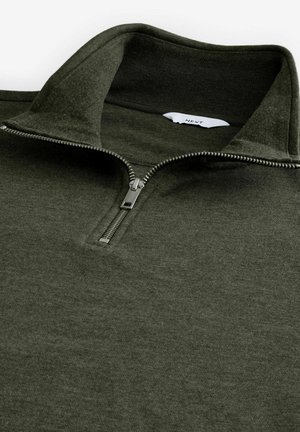 Olive green, zip-up fleece pullover with a high collar, featuring a silver zipper and soft textured fabric. Label visible inside the collar.