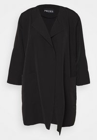Black loose-fitting cardigan with a lapel collar, long sleeves, side pockets, and a straight hem. Made from soft, lightweight fabric.