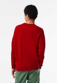 Lacoste Strickpullover - rouge