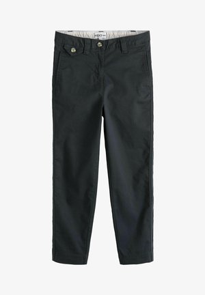 Tumedat rohelised chinos püksid puuvillast. Omab vööaasasid, kahte esimest taskut nööbiga sulgemisega ja siledat tekstuuri.