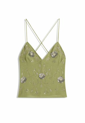 Olive green camisole with a V-neck, adjustable cross-back straps, embellished with silver floral embroidery and bead details.