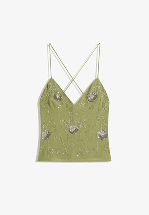 Olive green camisole with a V-neck, adjustable cross-back straps, embellished with silver floral embroidery and bead details.