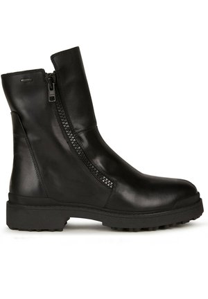 Black leather ankle boot featuring a smooth finish, side zipper, textured detailing on the zipper, and a rugged rubber sole.