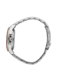 Silver metal watch with a round case, featuring a rose gold accent on the bezel, linked band, and a visible clasp mechanism.