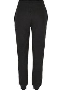 Schwarze Baumwoll-Jogginghosen mit geripptem Bund, Seitentaschen, schmal zulaufenden Beinen und elastischen Bündchen an den Knöcheln. Glatte Textur und schlichtes Design.