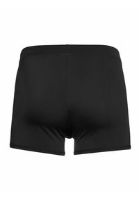 Čierne boxerky vyrobené z hladkej tkaniny s priliehavým strihom. Majú mäkký pás a minimálne švy pre čistý vzhľad.