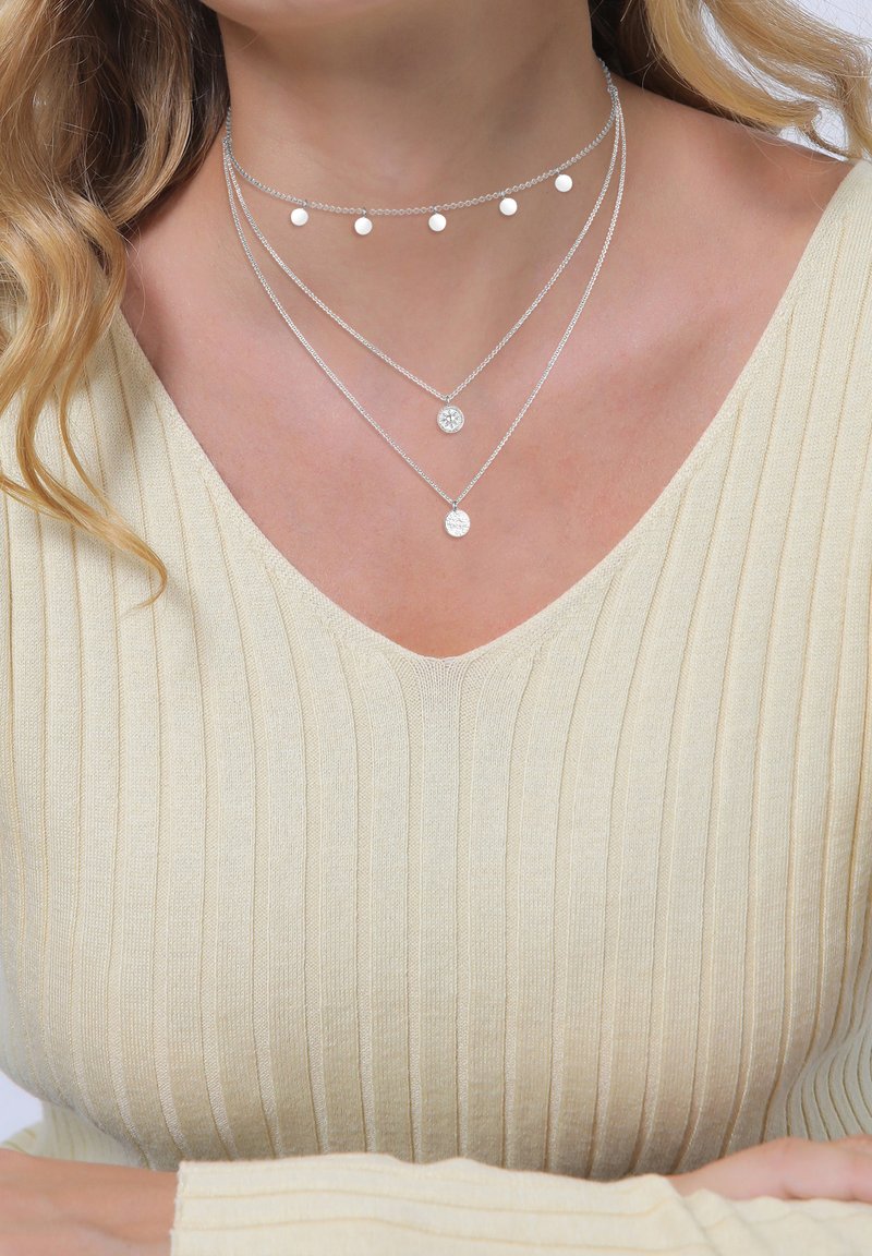 Collana rigida in argento. Triangolo d'Oro - Cose Cosi Gioielli