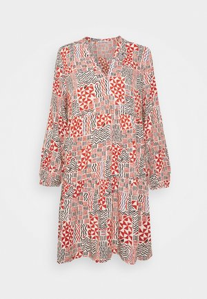Robe à manches longues avec un motif géométrique multicolore en rouge, noir et crème. Fabriquée en tissu léger avec une coupe ample.