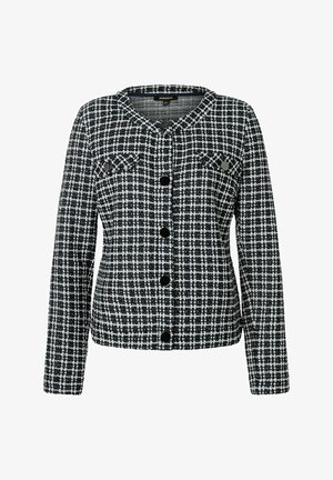 Schwarz-weißer karierter Blazer mit langen Ärmeln, Knopfleiste, zwei Brusttaschen und Rundhalsausschnitt. Hergestellt aus strukturiertem Stoff.