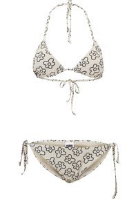 Bikini a due pezzi con motivi floreali contornati in nero su tessuto bianco, dotato di chiusure regolabili a laccio sopra e sotto.