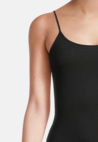 Black sleeveless swimsuit with thin straps, a smooth texture, and a form-fitting design, focusing on the upper torso area.