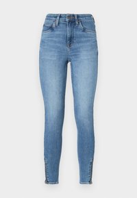 - Jeansy Skinny Fit