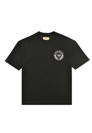 Black short-sleeve T-shirt with white circular logo on left chest reading "PAS DE MONACO 911 CLUB" surrounded by laurel leaves.
