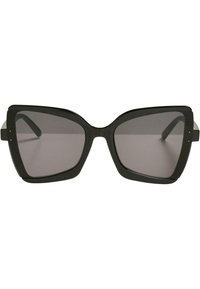 Ochelari de soare cu ramă pătrată neagră, cu lentile întunecate și margini groase. Prezentând un pod înalt și umeri largi pentru un design îndrăzneț.