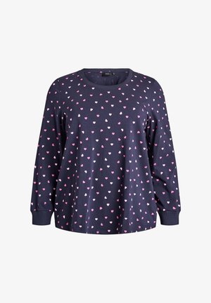 Tamsiai mėlynas ilgomis rankovėmis marškinėlis su mažomis rožinėmis ir baltomis širdelėmis. Apvalus kaklas ir laisvas kirpimas su ribuotomis rankogaliais.