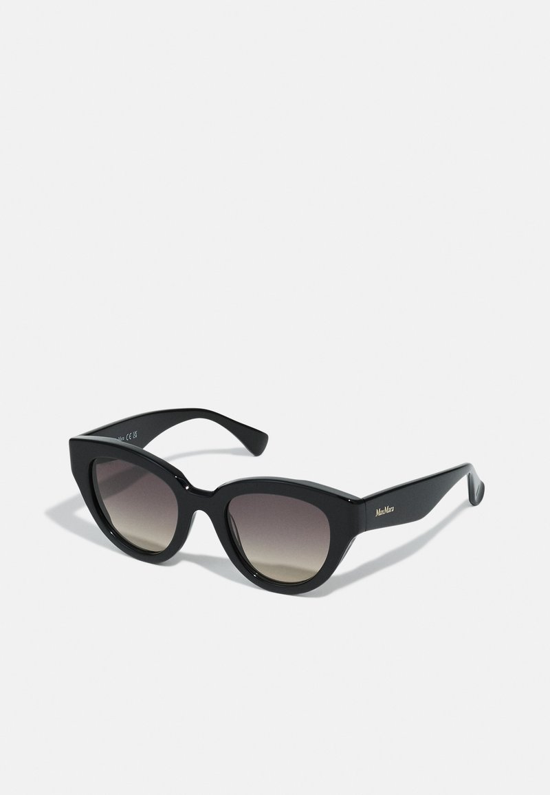 Black cat-eye sunglasses with a glossy finish, gradient lenses, wide frames, and engraved "MaxMara" logo on the side.