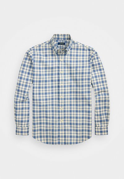 Cămașă cu nasturi în carouri de culoare albastru deschis și galben, cu mâneci lungi, guler din țesătură și un detaliu cu buzunar pe pieptul stâng.