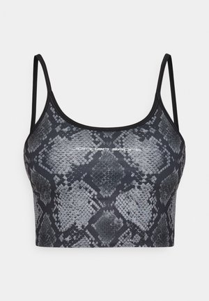 Sportovní podprsenka s tímto motivem hadí kůže ve černé a šedé barvě, tenkými ramínky a přiléhavým střihem, doplněná o kontrastní černé lemování. Na přední straně je logo.