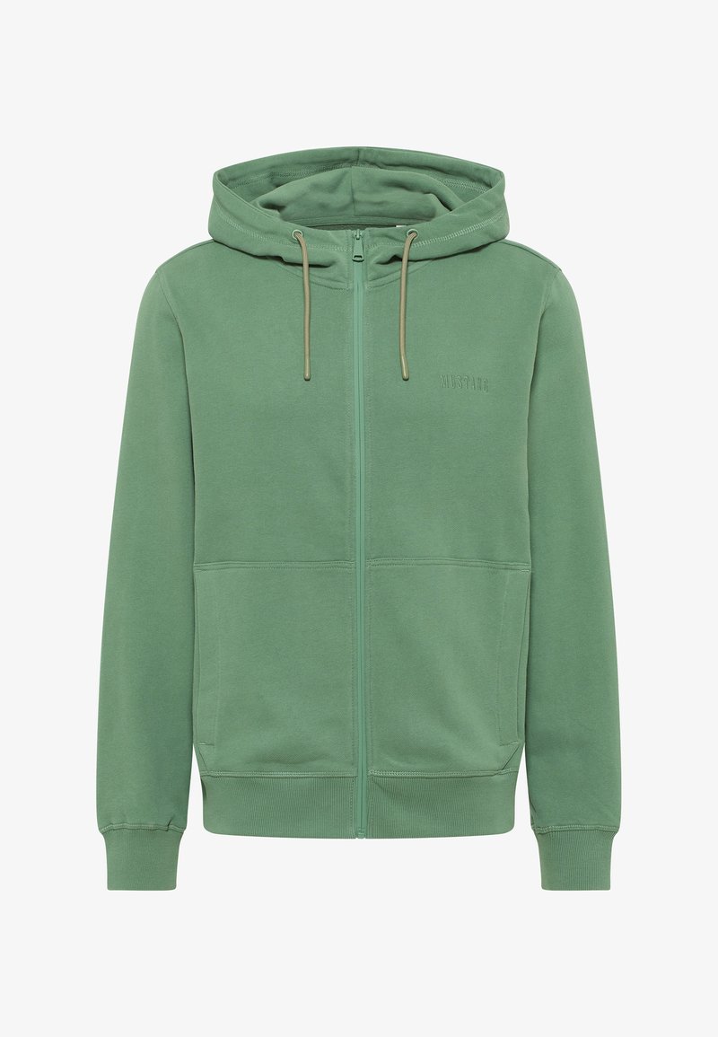 Haut à capuche zippé vert en tissu doux. Comprend une capuche, des cordons de serrage et des poches latérales. Fini texturé avec des poignets et une taille côtelés.