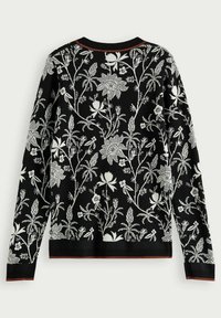 Sort strikket sweater med hvid blomstermønster. Har ribbede manchetter og krave med en smal rød detalje. Blomstermønstre dækker ryggen.