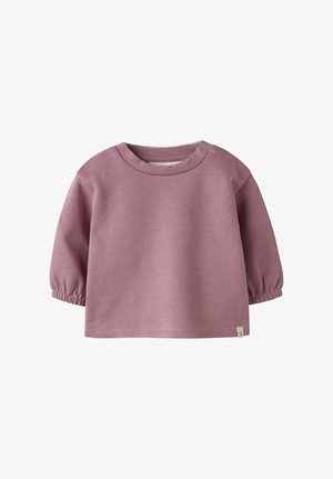 Top rosa in cotone a maniche lunghe con collo rotondo, maniche arricciate e una piccola etichetta del marchio sull'orlo. Tessuto morbido e liscio.