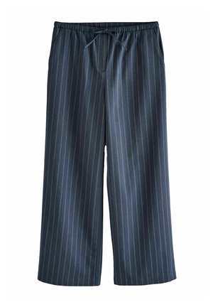 Bredde bukser lavet af et mørkt stof med vertikale pinstriber i lys blå. Har en elastisk talje med snørebånd og sidelommer.