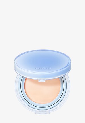 Kompaktes beiges Puder-Make-up mit einem durchscheinenden hellblauen Deckel und "rom&nd"-Markenlogo oben.