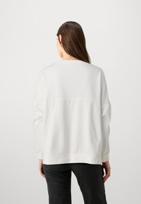 DRYKORN LUNAIA - Mikina - offwithe