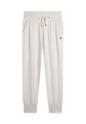 Joggers color crema con vita regolabile, tasche laterali, caviglie a polsino e un piccolo logo sulla coscia. Tessuto morbido.