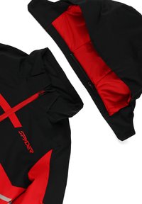 Black jacket with red accents, featuring a zip closure, a hood, and a moisture-resistant fabric. The interior is fully lined in red.