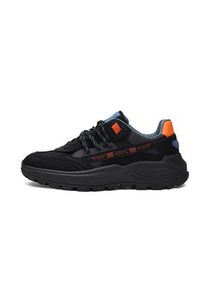 Black athletic sneaker with mesh and leather accents, featuring orange and blue details, textured sole, and distinctive lacing system.